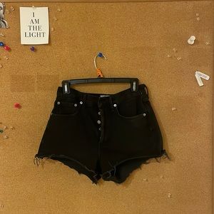 Agolde black denim cutoffs button fly closure